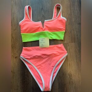 LainSnow Coral/Neon. 
Small top
Medium bottom
